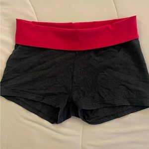 Arie medium sized grey and pink feather shorts yoga shorts.